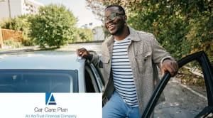 Smiling man getting in car